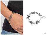 Has a WING to It - White Bracelet